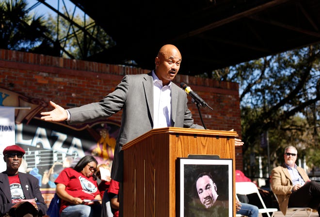 Chuck Chestnut, chair of the Alachua County Commission, speaks during the King Celebration 2015 National Holiday Kick-Off event at Bo Diddley Downtown Community Plaza Monday, January 19, 2015. (Doug Finger/The Gainesville Sun)
