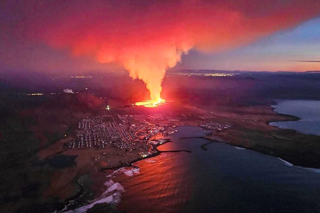 January 14, 2024: Billowing smoke and flowing lava are seen in this Icelandic Department of Civil Protection and Emergency Management handout image during a volcanic eruption on the outskirts of the evacuated town of Grindavik, western Iceland. Seismic activity had intensified overnight, and residents of Grindavik were evacuated, Icelandic public broadcaster RUV reported. This is Iceland's fifth volcanic eruption in two years, the previous one occurring on Dec. 18, 2023, in the same region southwest of the capital Reykjavik. Iceland is home to 33 active volcano systems, the highest number in Europe