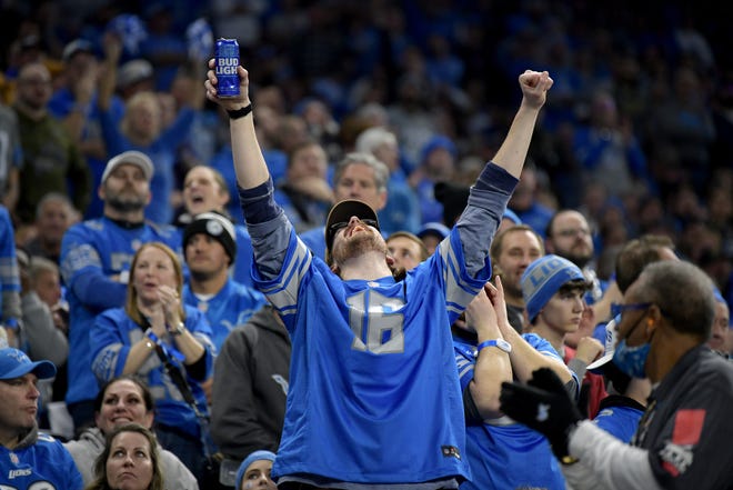 January 14, 2024: A Detroit Lions fan celebrates after a 2024 NFC wild-card game against the Los Angeles Rams at Ford Field.