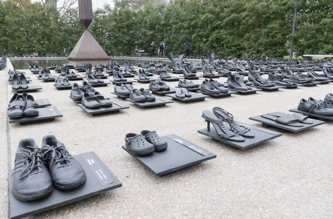January 15, 2024: An installation by artist Sandeigh Kennedy of 657 pairs of shoes in memory of the more than 600 mass shootings that occurred in the United States in 2023 is seen in Houston, Texas, as the country marks Martin Luther King, Jr. Day. Each pair of shoes has "a marker denoting the location, date, number of injuries, and the number of lives lost at each event. Each pair is painted black to give a sense of equality to each victim," says the Texas artist. The shoes are displayed in front of the Broken Obelisk, a Barnett Newman sculpture, at the Rothko Chapel Plaza. In 1969, the city of Houston refused to place it in front of its City Hall because it was honoring Martin Luther King.