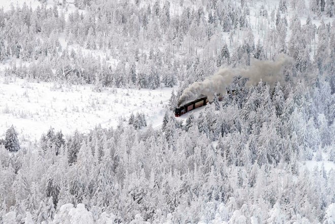 January 17, 2024: A steam train travels through a snow-covered landscape on the way to northern Germany's 1,142-meter (3,743-foot) highest mountain, 'Brocken', at the Harz mountains near Schierke, Germany.