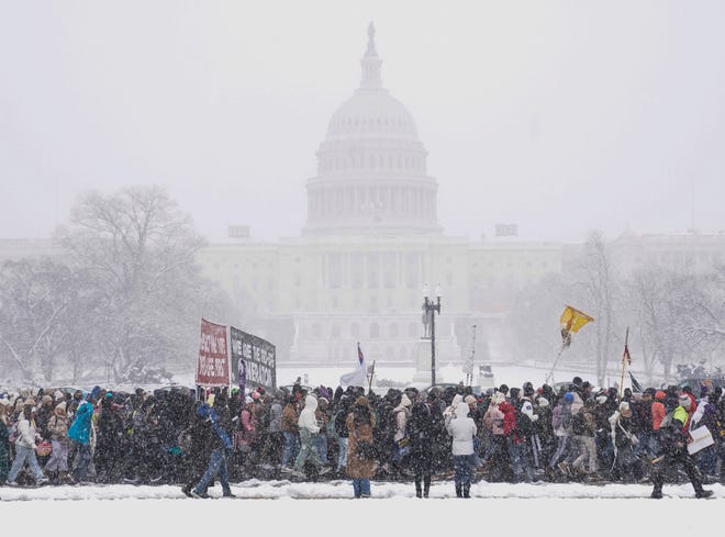 January 19, 2024: In a snow storm anti-abortion activists march and rally in front of the U.S. Capitol during the annual March for Life in Washington on January 19, 2024. The event ended at the U.S. Supreme Court.