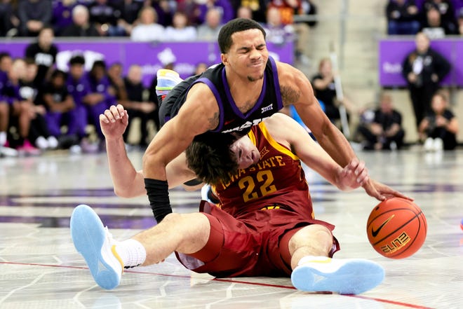 January 20, 2024 : TCU Horned Frogs guard Jameer Nelson Jr. and Iowa State Cyclones forward Milan Momcilovic go for a loose ball during the second half at Ed and Rae Schollmaier Arena in Fort Worth, Texas.