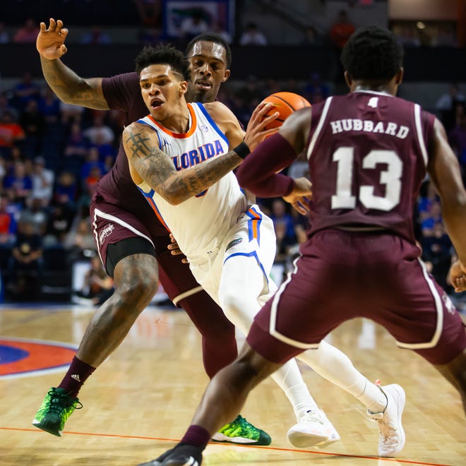 Florida Gators guard Will Richard (5) drives to the basket. The Florida men’s basketball team hosted the Mississippi State Bulldogs at Exactech Arena at the Stephen C. O’Connell Center in Gainesville, FL on Wednesday, January 24, 2024. [Doug Engle/Ocala Star Banner]