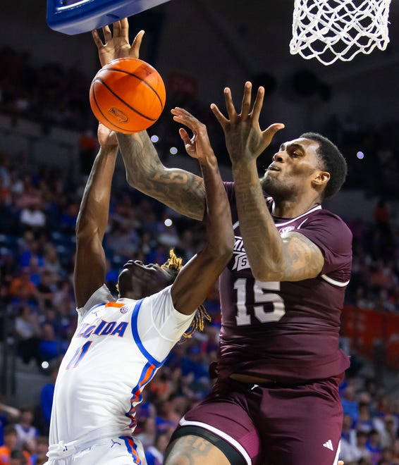 Florida Gators guard Denzel Aberdeen (11) is denied the basket by Mississippi State Bulldogs forward Jimmy Bell Jr. (15) in the first half. The Florida men’s basketball team hosted the Mississippi State Bulldogs at Exactech Arena at the Stephen C. O’Connell Center in Gainesville, FL on Wednesday, January 24, 2024. [Doug Engle/Ocala Star Banner]