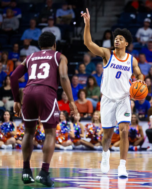 Florida Gators guard Zyon Pullin (0) calls an offensive play in the first half. The Florida men’s basketball team hosted the Mississippi State Bulldogs at Exactech Arena at the Stephen C. O’Connell Center in Gainesville, FL on Wednesday, January 24, 2024. [Doug Engle/Ocala Star Banner]