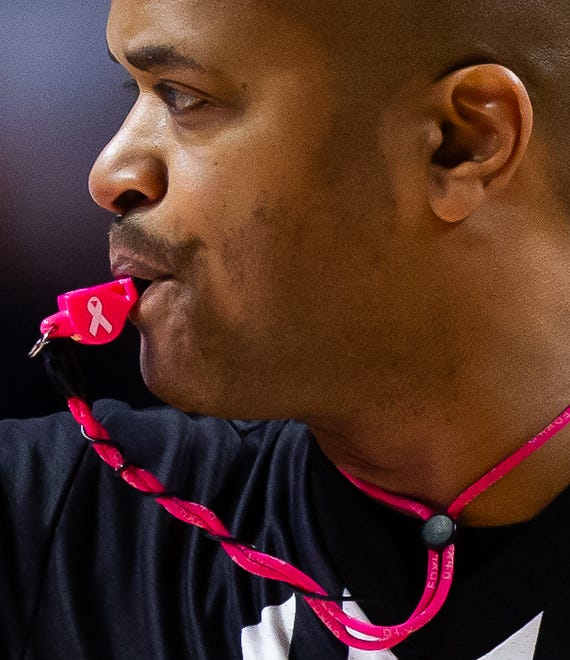 A referee uses his breast cancer awareness themed whistle during the second half. The Florida men’s basketball team hosted the Mississippi State Bulldogs at Exactech Arena at the Stephen C. O’Connell Center in Gainesville, FL on Wednesday, January 24, 2024. Florida won 79-70. [Doug Engle/Ocala Star Banner]