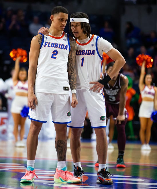 Florida Gators guard Riley Kugel (2) and Florida Gators guard Walter Clayton Jr. (1) talk in the final second of the game. The Florida men’s basketball team hosted the Mississippi State Bulldogs at Exactech Arena at the Stephen C. O’Connell Center in Gainesville, FL on Wednesday, January 24, 2024. Florida won 79-70. [Doug Engle/Ocala Star Banner]
