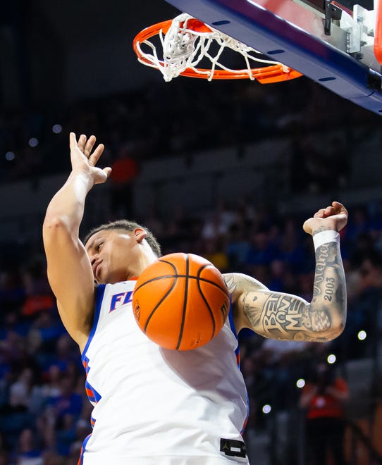 Florida Gators guard Riley Kugel (2) slam dunks the ball in the second half. The Florida men’s basketball team hosted the Mississippi State Bulldogs at Exactech Arena at the Stephen C. O’Connell Center in Gainesville, FL on Wednesday, January 24, 2024. Florida won 79-70. [Doug Engle/Ocala Star Banner]