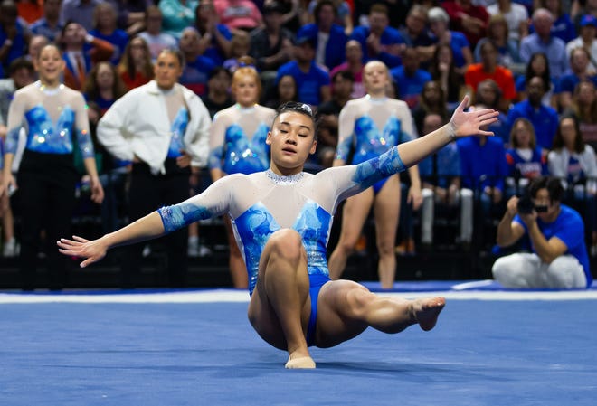 Florida Gators gymnast Leanne Wong performs her flood exercise. The Florida Gators hosted the Alabama Crimson Tide at Exactech Arena at The Stephen C O'Connell Center in Gainesville, FL on Friday, January 26, 2024. [Doug Engle/Gainesville Sun]