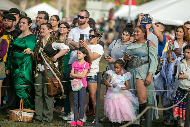 Faire-goers enjoy the entertainment during the annual Hoggetowne Medieval Faire at Depot Park in Gainesville, FL on Saturday, January 27, 2024.