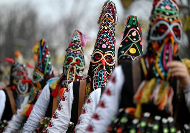 January 27, 2024 : Bulgarian "Kukeri" dancers participate with their masks as they perform in the International Festival of the Masquerade Games in Pernik, near Sofia, Bulgaria. The Kukeri Carnival is a festival, which started on January 26, as participants wearing multi-coloured masks, covered with beads, ribbons and woollen tassels. The heavy swaying of the main mummer is meant to represent wheat heavy with grain, and the bells tied around the waist are intended to drive away the evil spirits and the sickness.